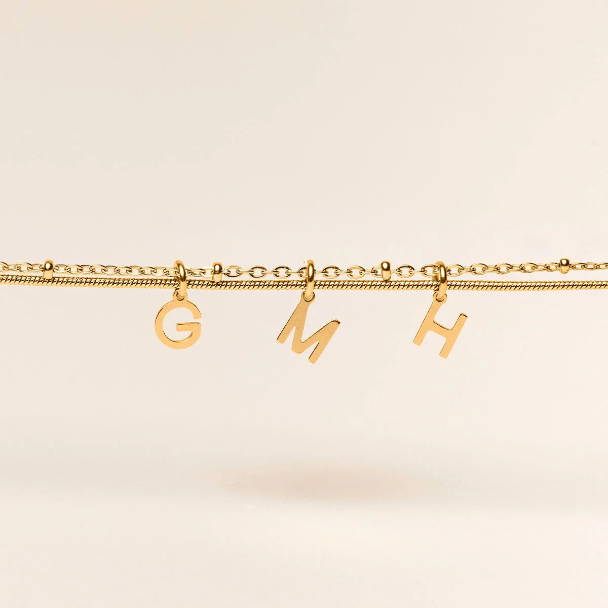 Bracelet double rang lettre à personnaliser - Doré