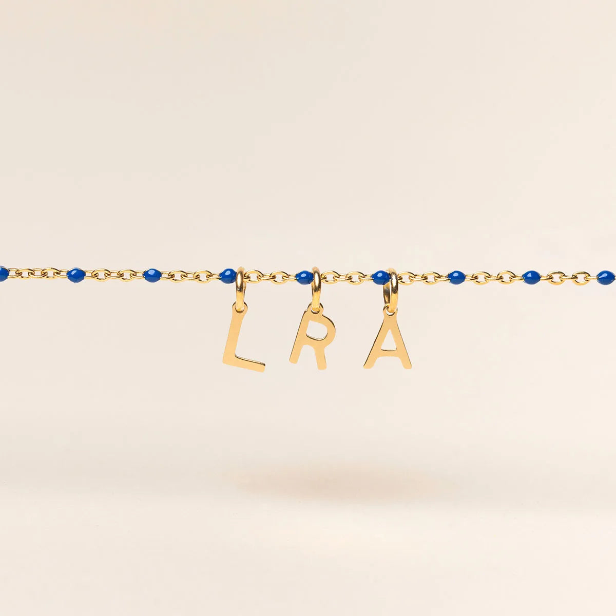 Bracelet chaîne perlée avec lettre à personnaliser - Doré