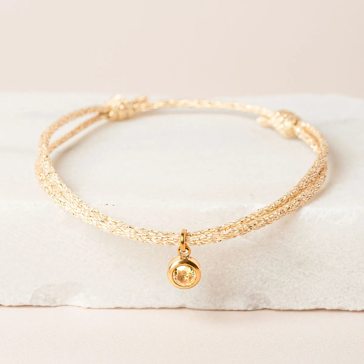 Bracelet femme cordon scintillant avec pierre de naissance - Doré
